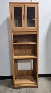 lot 28 image: Tall Wooden Entertainment Unit with Glass Doors