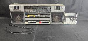 lot 90 image: Vintage Sanyo M W220 Boombox with Elvis Presley Preloaded Media Player