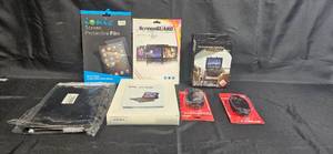 lot 93 image: Assorted Gadget Accessories Set with Keyboard Case and Screen Protectors