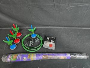 lot 180 image: Mixed Lot Lawn Edging, Child Safety Covers, and Lawn Game Set