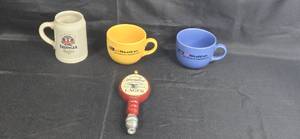 lot 104 image: Yuengling Lager Tap Handle and Set of 3 Branded Mugs