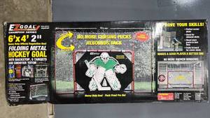 lot 226 image: EZGoal Folding Metal Hockey Goal with Backstop, 5 Targets, and Shooter Tutor in orig pkg