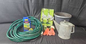 lot 255 image: Garden Equipment Set with Hoses, Sprinkler, and Planters