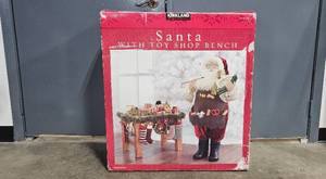 lot 280 image: Kirkland Santa with Toy Shop Bench Holiday Decor - in orig box