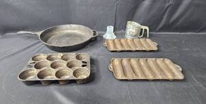 lot 24 image: Cast Iron Cookware Pieces and more