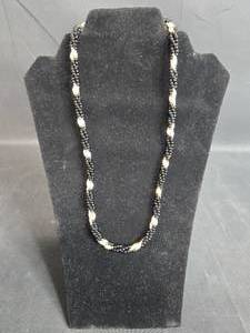 lot 48 image: Handcrafted Black Beaded Necklace with Gold Accents
