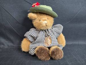 lot 79 image: Vintage Gund Teddy Bear in Plaid Dress with Green Hat