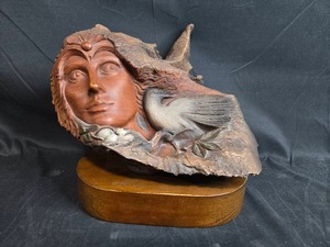 lot 160 image: Native American Art Sculpture with Woman and Bird by Rick Cain