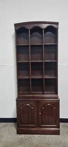 lot 115 image: Large Wooden Bookshelf with Dual Cabinet Doors
