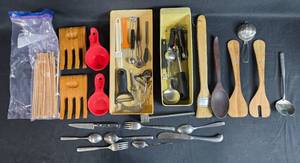 lot 16 image: Assorted Kitchen Utensil Collection with Serving Forks, Spoon, and Measuring Cups