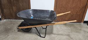 lot 204 image: Used Blue Hawk Wheelbarrow with Wooden Handles