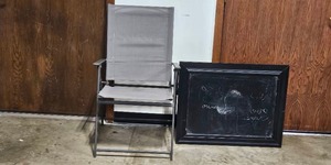 lot 212 image: Gray Folding Steel Chair and Abstract Framed Chalkboard