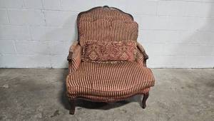 lot 215 image: Vintage Striped Upholstered Armchair with Elegant Design