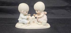 lot 231 image: 1984 Precious Moments Figurine God Bless Our Home by Samuel J. Butcher