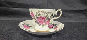 lot 240 image: Queen Anne Bone China Birthday Teacup and Saucer Set