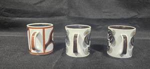 lot 247 image: Set of Royal Copenhagen Faience Mugs with Unique Designs