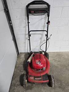 lot 298 image: Used Toro 6.5 HP Gas Lawn Mower with Recycler System