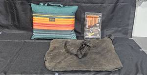 lot 311 image: Pendleton Cushion, Chainsaw Sharpening Kit, and Black Canvas Bag Set