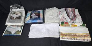 lot 357 image: Assorted Linens and Textiles Collection with Tablecloths and Throws