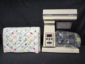 lot 379 image: Vintage Mr. Coffee Digital Control Coffee Maker with Quilt Cover