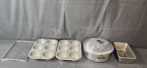 lot 29A image: Collection of Baking Pans and a Stainless Steel Pot with Lid