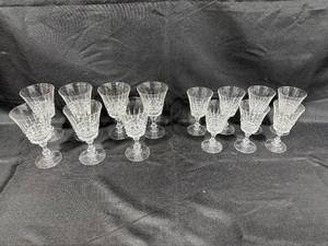 lot 348 image: Set of Crystal Wine Glasses with Elegant Ribbed Design