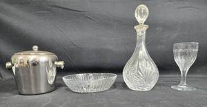 lot 502 image: Elegant Dining Set with Crystal Decanter, Goblet, Stainless Steel Ice Bucket, and Glass Bowl