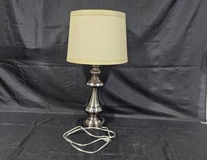 lot 515 image: Elegant Table Lamp with Brushed Metal Base and Beige Shade