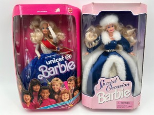 lot 54 image: Special Edition UNICEF and Special Occasion Barbie Dolls Set