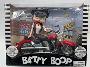 lot 85 image: Biker Betty Boop Doll with Motorcycle and Interactive Features