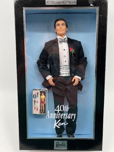 lot 132 image: 40th Anniversary Ken Doll in Tuxedo with Rose Accessory
