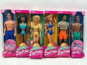 lot 211 image: Set of 5 Sun Sensation Barbie and Ken Dolls