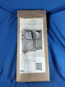 lot 105 image: Honey-Can-Do 60 2-Door Portable Wardrobe Closet with Cover and Side Pockets