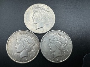 Three Circulated Peace Dollars