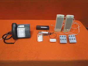 lot 34 image: Microphone, Speakers, Multi Function Phone, Outlet Adapters
