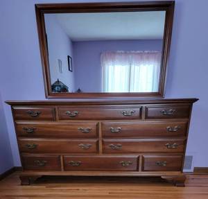 lot 15 image: Classic Cherry 10 Drawer Bedroom Dresser and Mirror