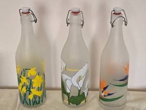 lot 237 image: Delightful Handpainted Floral Glass Bottle Set - (3)