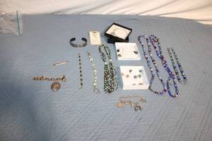 lot 4 image: Collection of Assorted Jewelry Including Necklaces, Bracelets, and Earrings