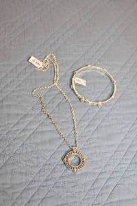 lot 9 image: Sterling Silver Jewelry Set with Necklace and Bangle