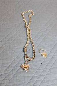 lot 15 image: Heart Pendant Necklace and Earring Set with Silver and Gold Design