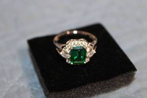lot A-16 image: Green Gemstone Accent Ring in Platinum Plated Setting