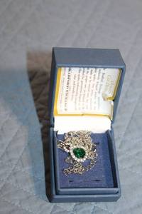 lot 41 image: Elegant Silver Necklace with Green Gemstone Pendant and Crystal Accents