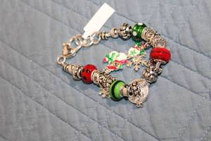 lot 43 image: Festive Silver-Tone Charm Bracelet with Holiday Motifs