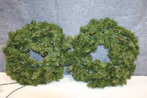 lot 49 image: Pair of Pre-Lit Artificial Christmas Wreaths - 24 Inches