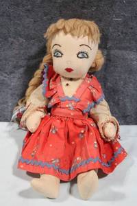lot 61 image: Vintage Handmade Rag Doll with Braided Hair and Floral Dress