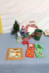 lot 95 image: Assorted Christmas Decor Collection with Miniature Tree and Santa Wall Art