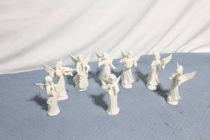 lot 96 image: Set of 8 White Porcelain Angel Figurines
