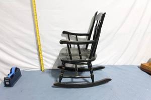 lot 182 image: Black Wooden Rocking Chair with Spindle Design