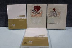 lot 233 image: Set of 4 Room Essentials 8.5x11 Inch Photo Frames with Heart Artwork