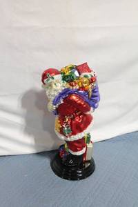 lot 265 image: Colorful Santa Figure with Bag of Gifts